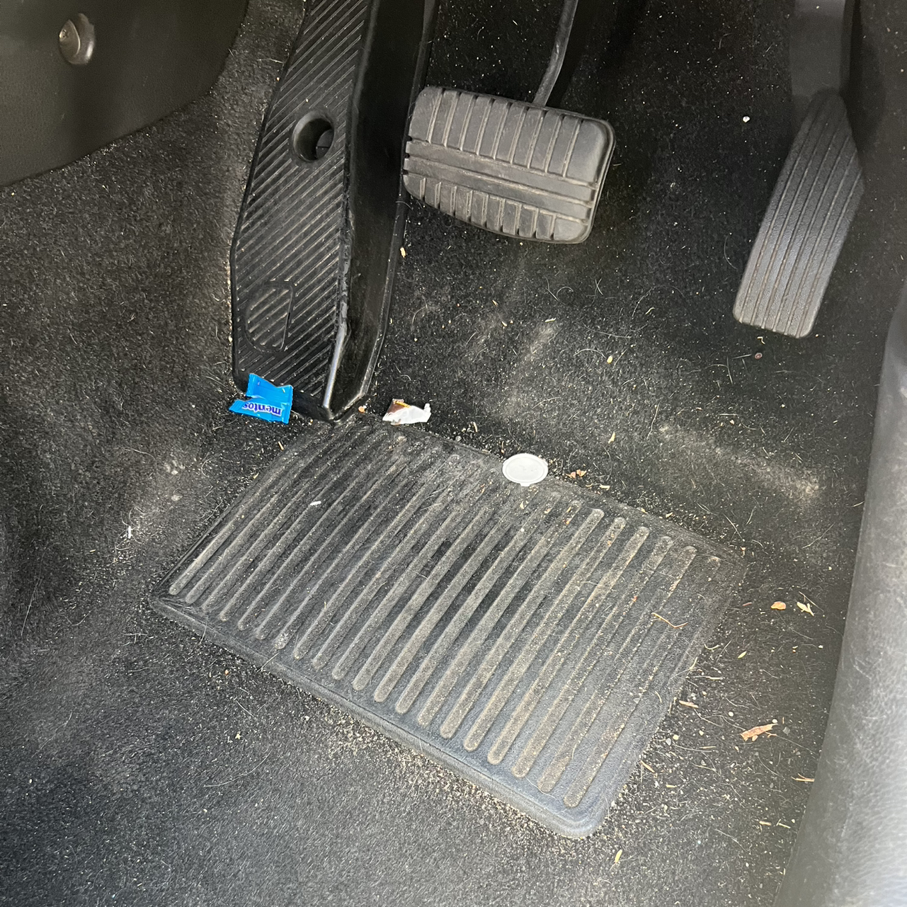 Vehicle before detailing — dirty exterior with grime and water spots